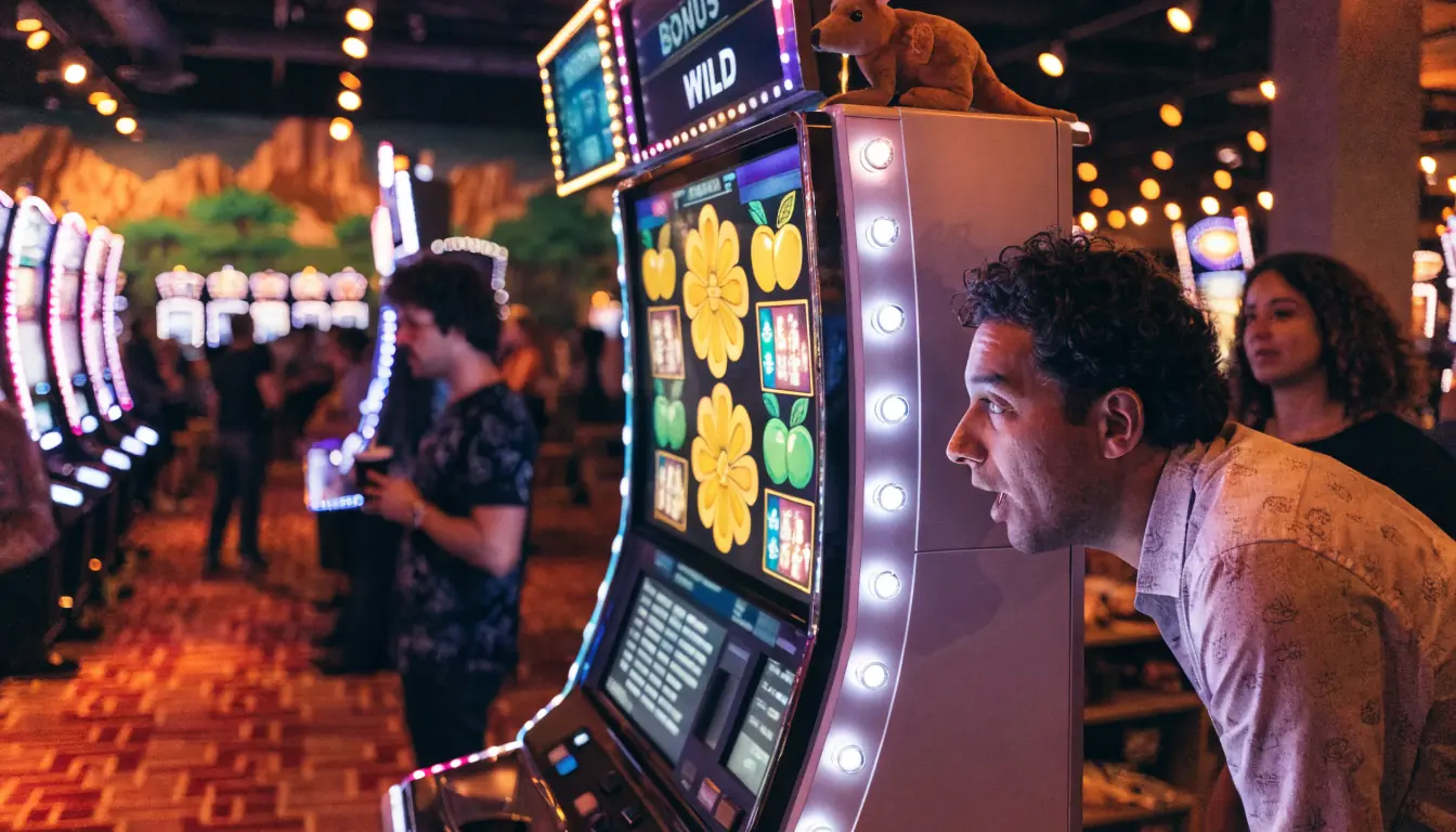 Australian casino floor with illuminated slot machine and outback decor